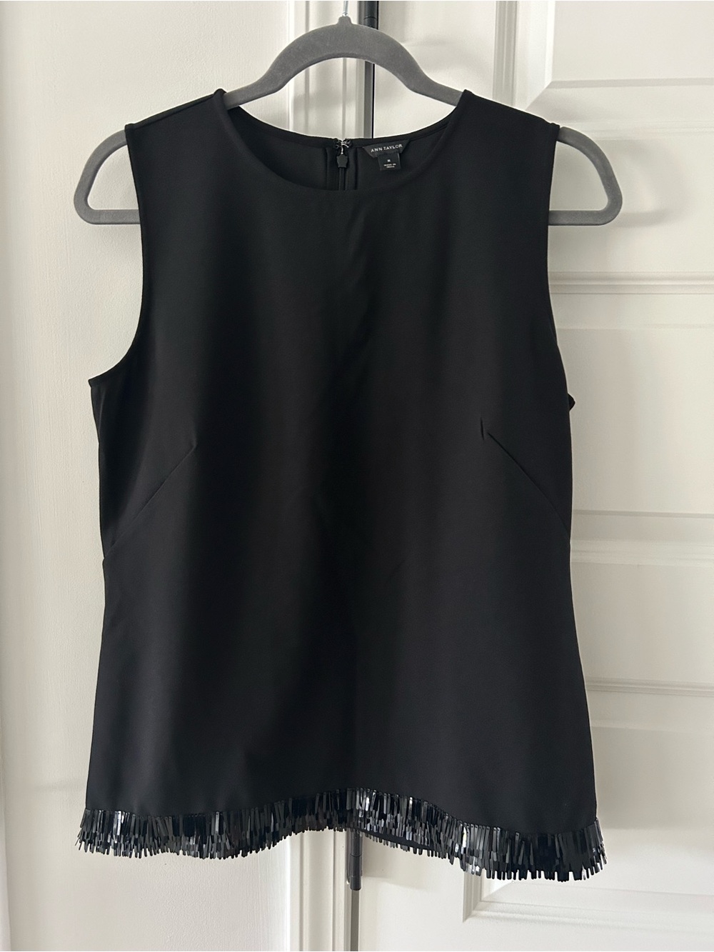Ann Taylor Chic and Sophisticated Black Sleeveless Top with Fringe Sequined Hem